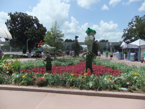 A Phineas and Ferb Topiary on the walkway between Future World and the World Showcase in Epcot