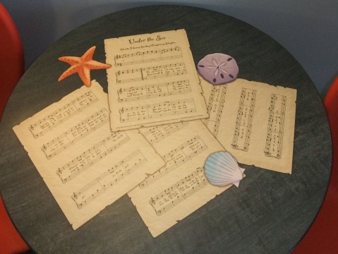 Sheet Music for "Under the Sea" on table in Little Mermaid room