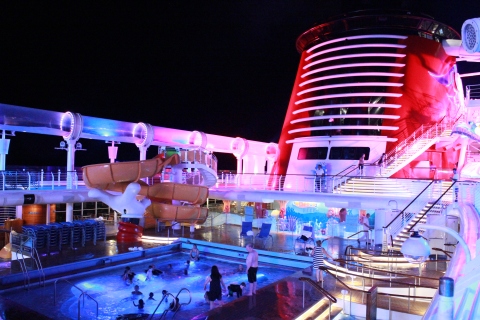 Pool area of the Disney Fantasy at night (photo by Miss Bonnie)
